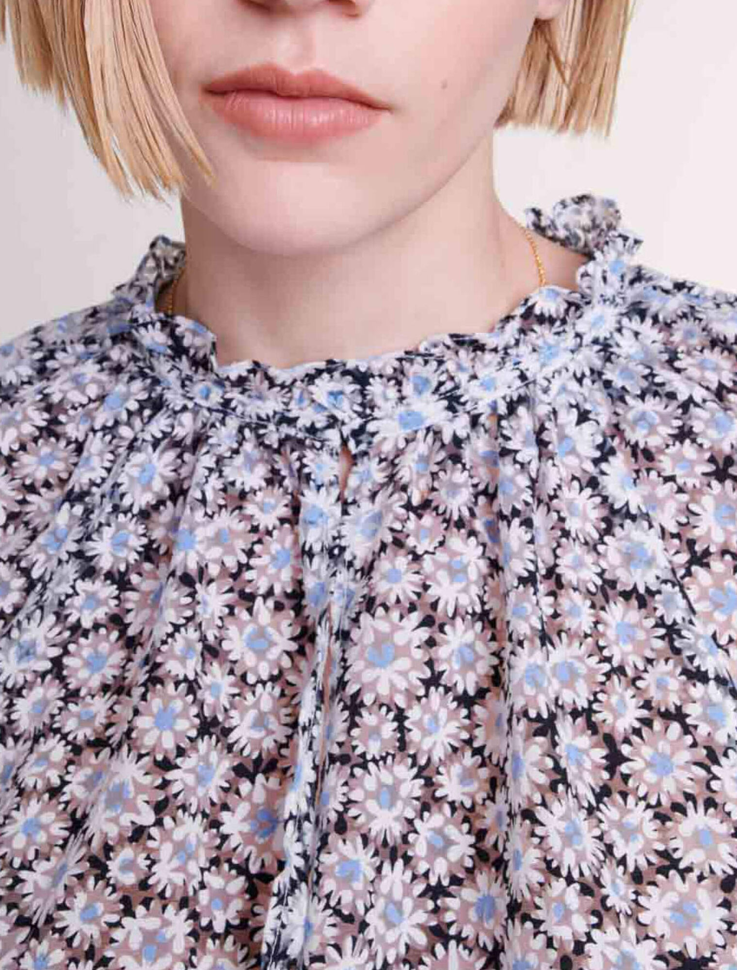 Blusa con stampa a fiori