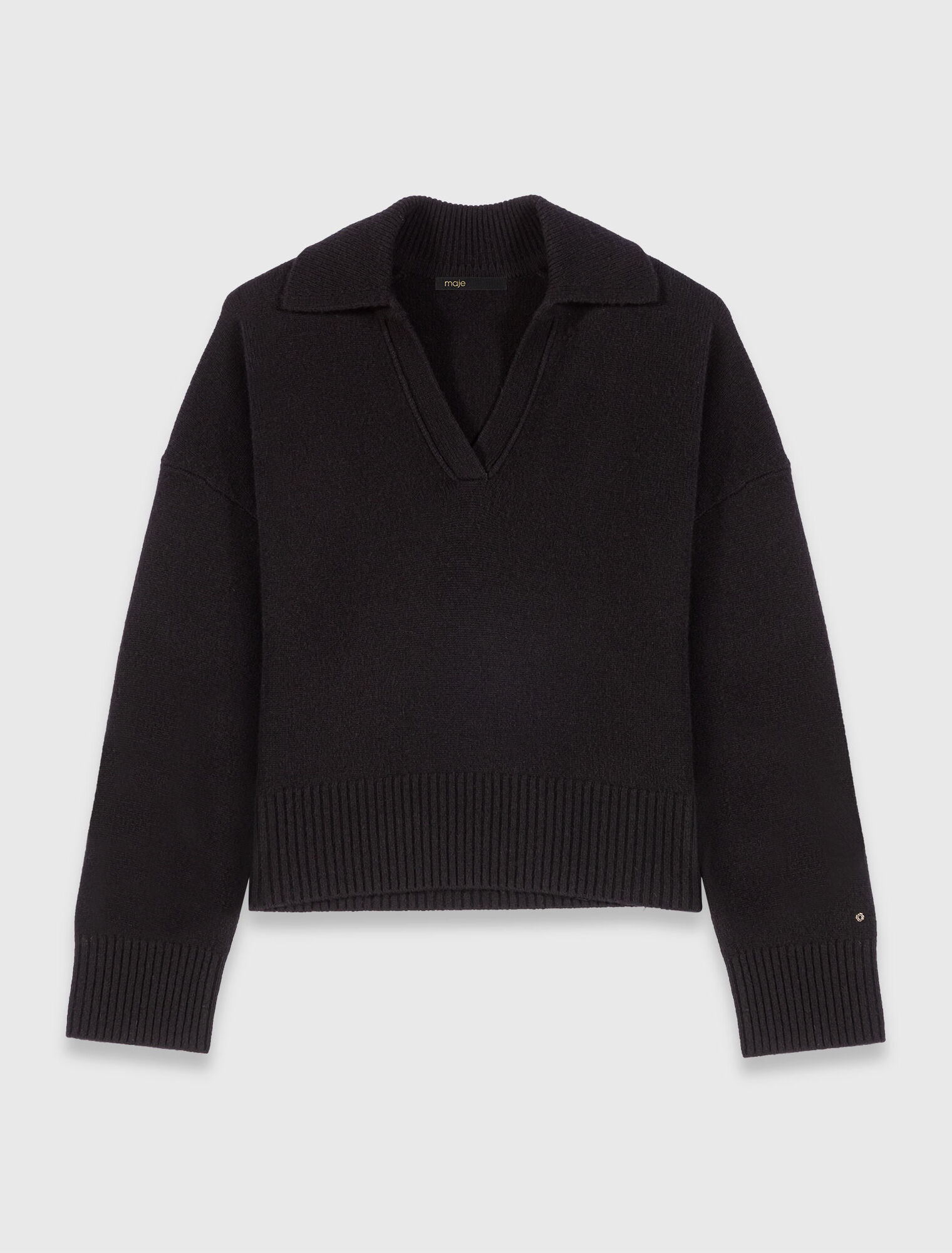Maglione con collo polo aperto