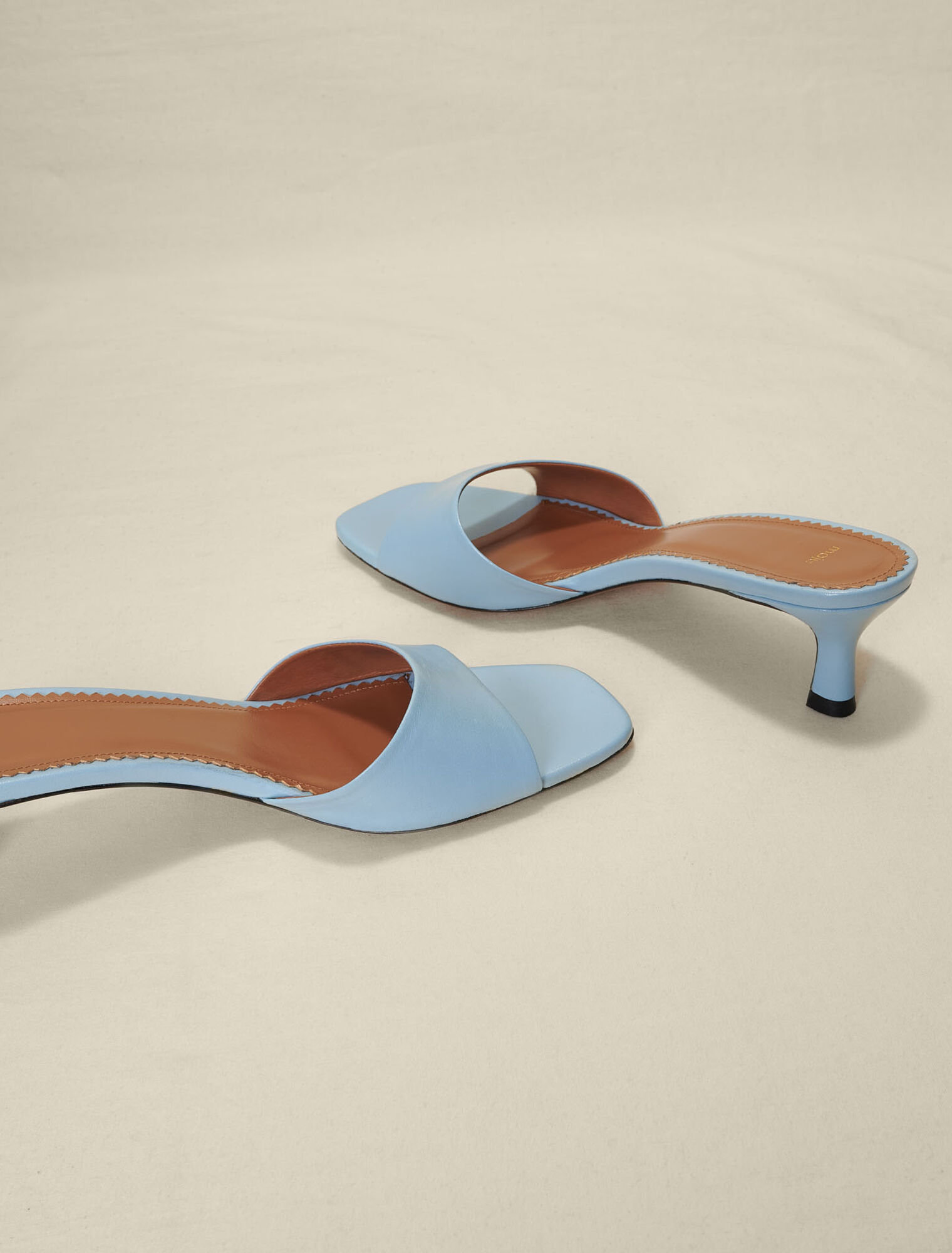 Mules in pelle