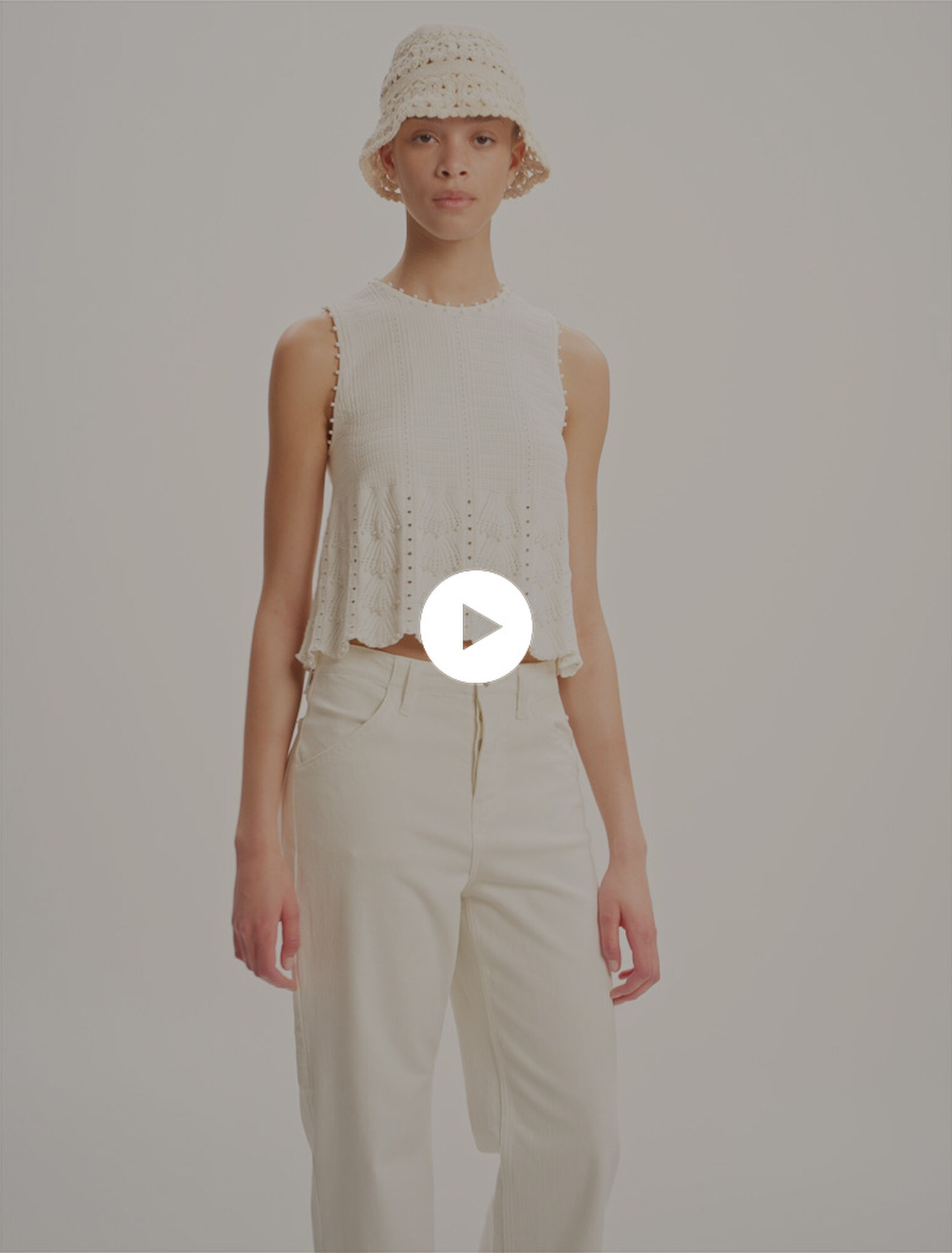Top in maglia pointelle con perle