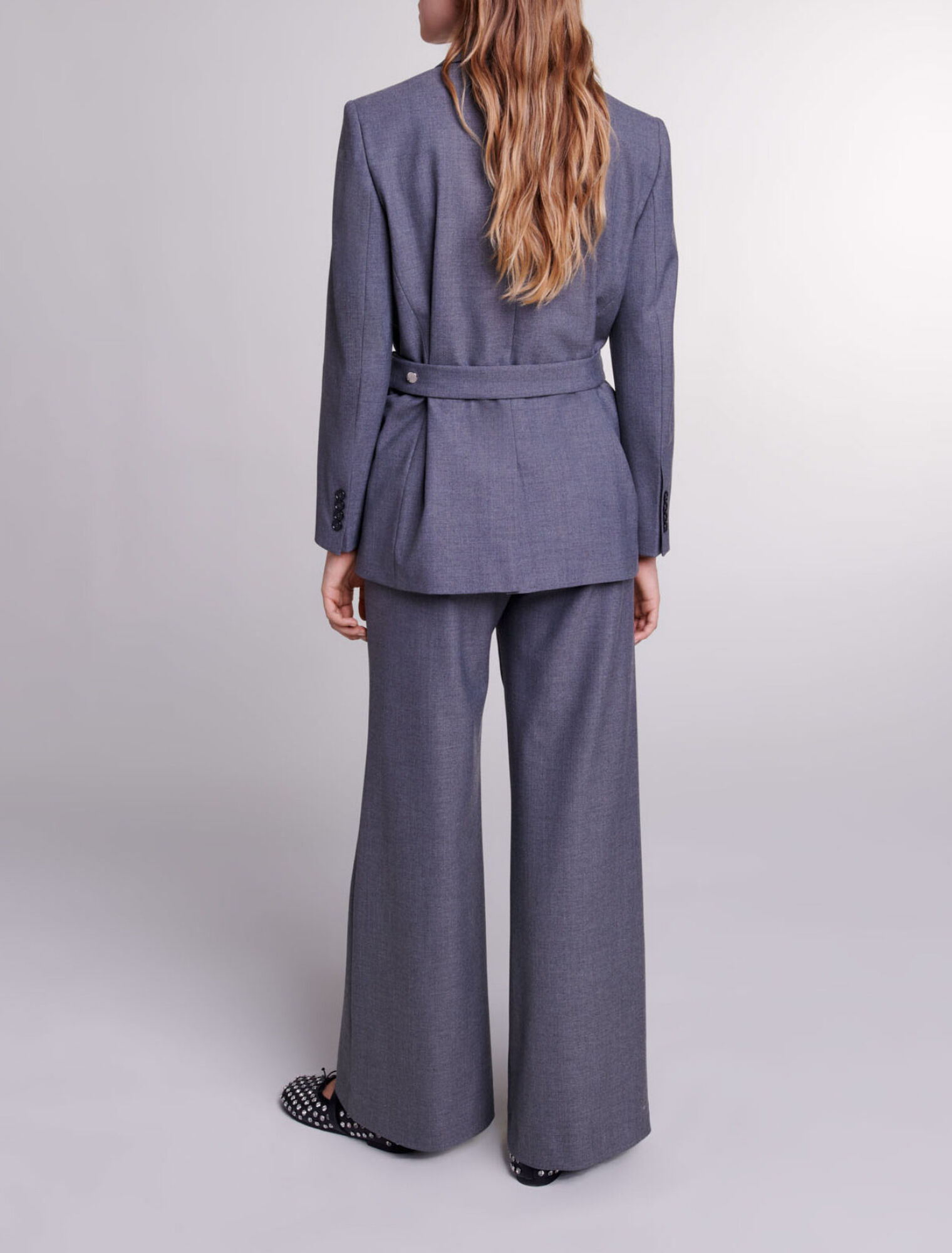 Giacca tailleur con catena in vita