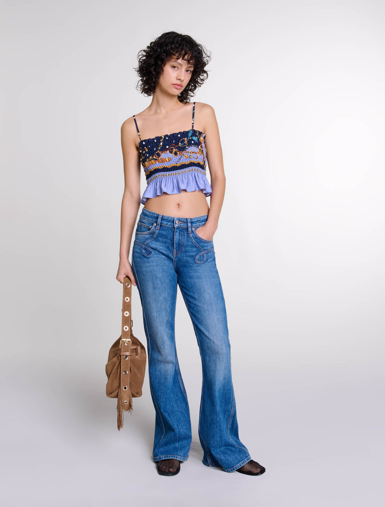 Jeans flare con tasche ricamate