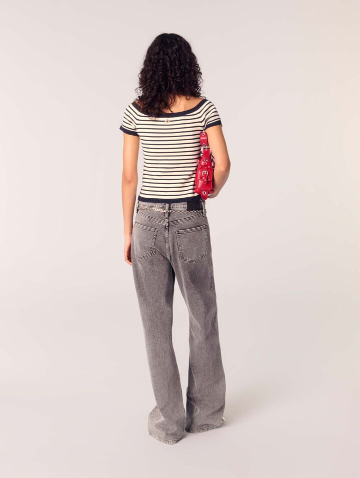 Jeans larghi e cintura a maglie