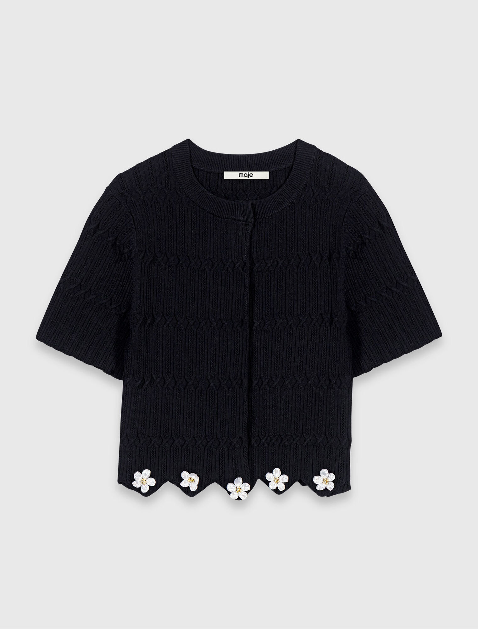 Cardigan con bijoux floreali