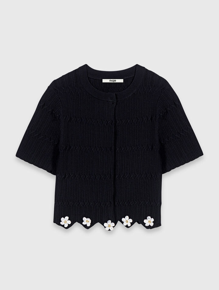 Cardigan con bijoux floreali
