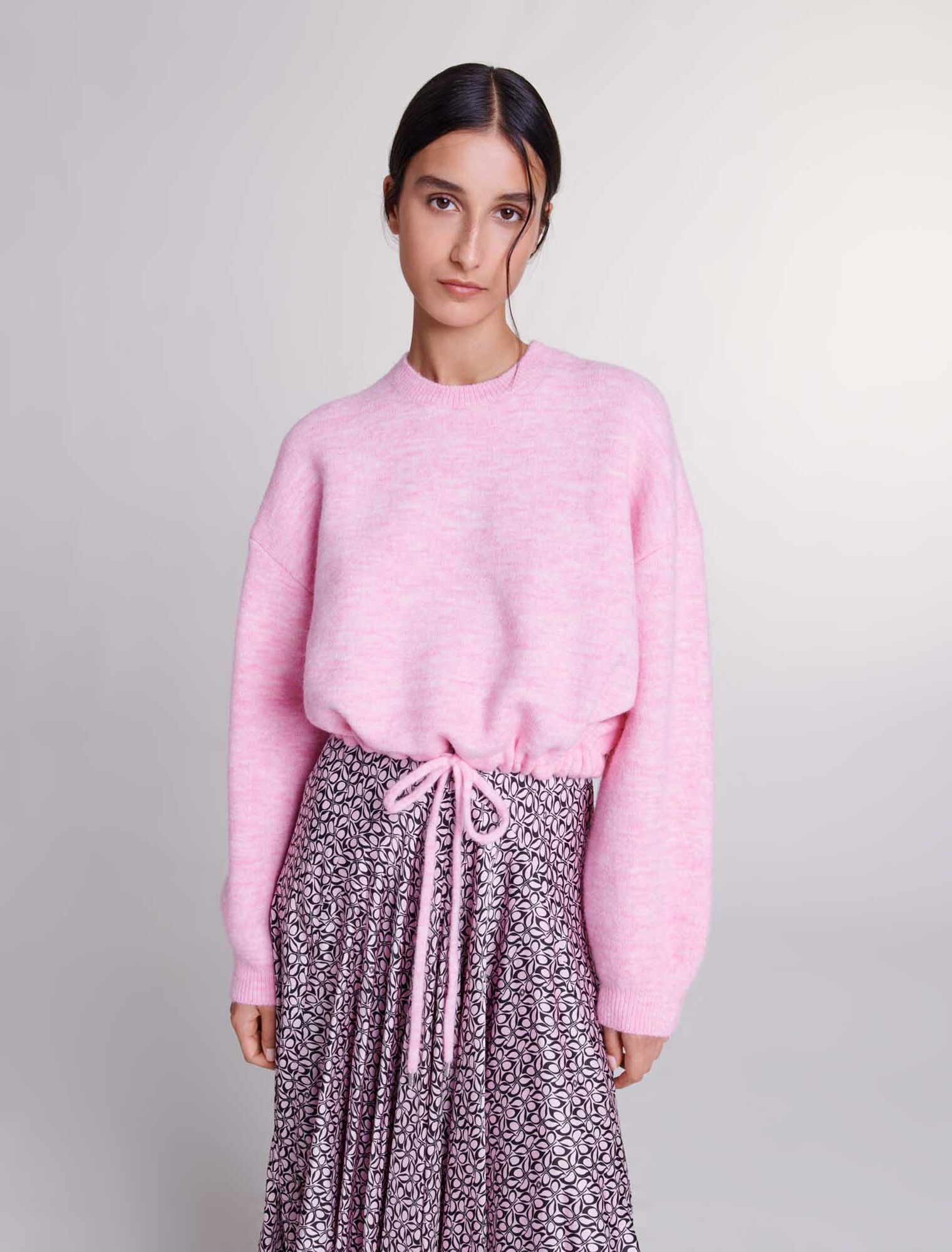 Pull corto in maglia allacciato