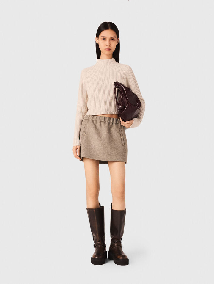 Maglione corto in maglia a trecce