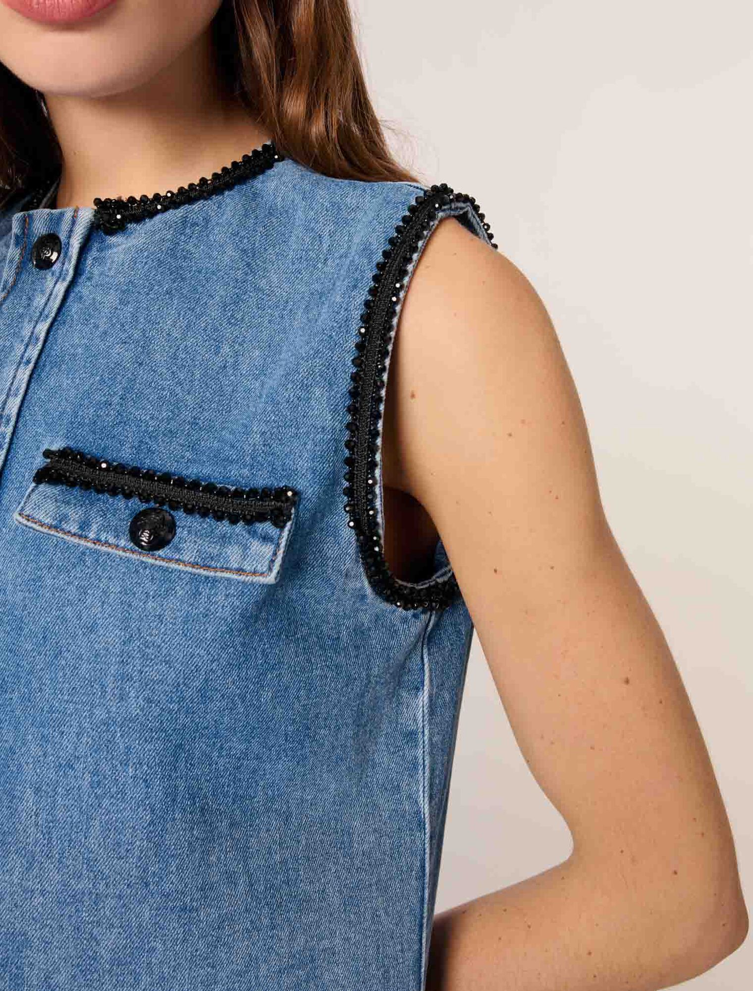 Abito denim e passamanerie ricamate
