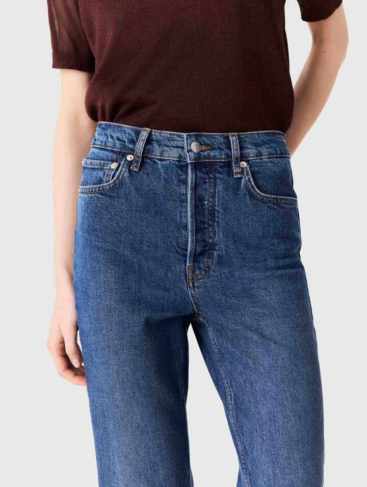 Jeans slim con spilla
