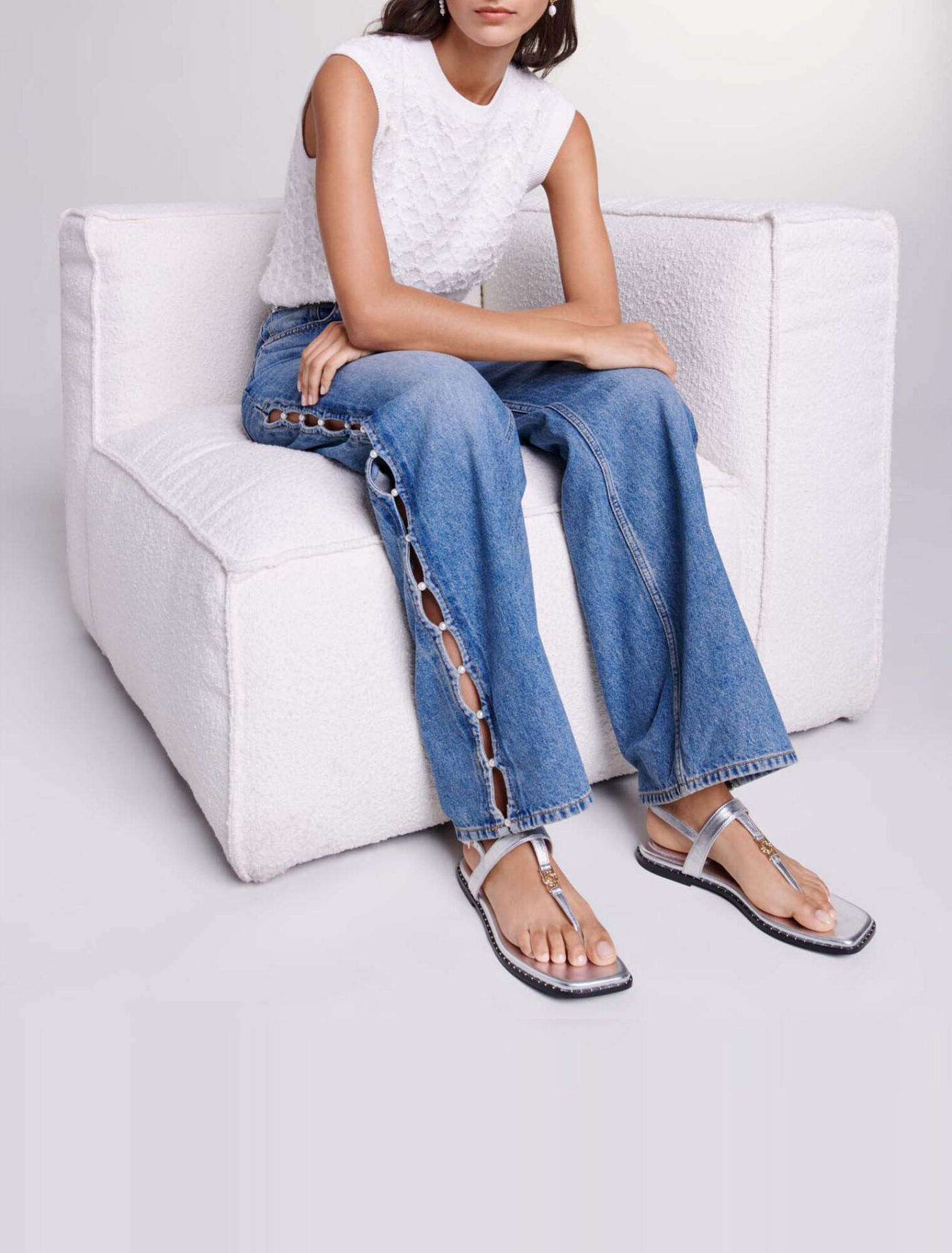 Jeans dritti traforati con perline
