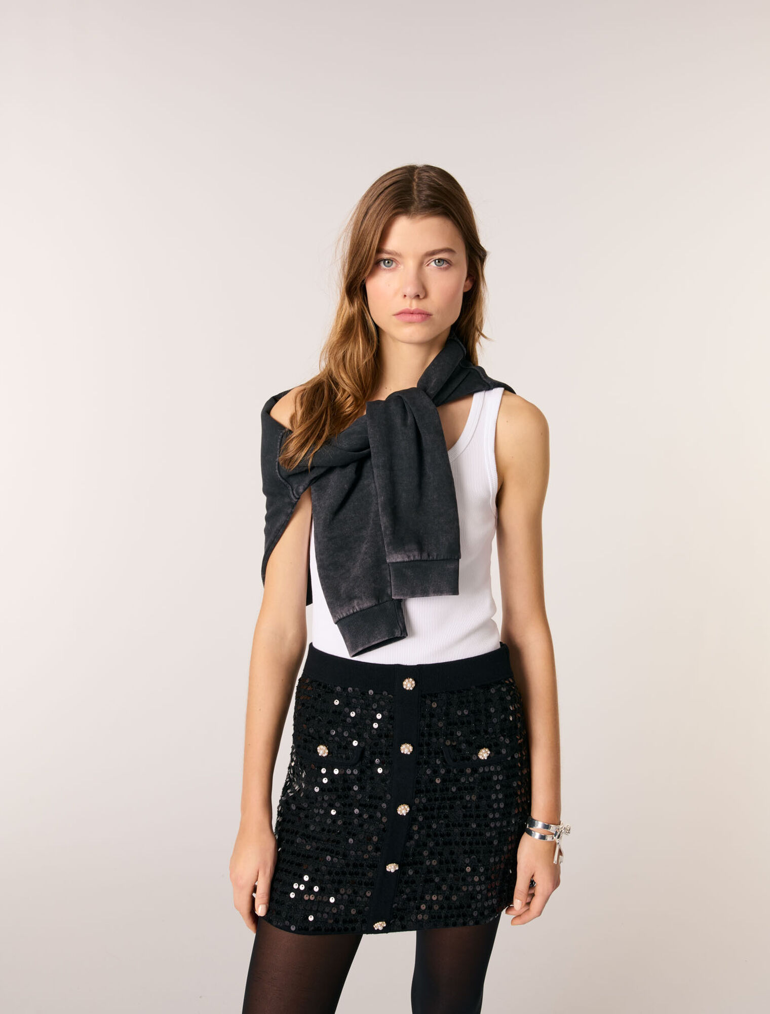 Gonna corta in maglia paillettes