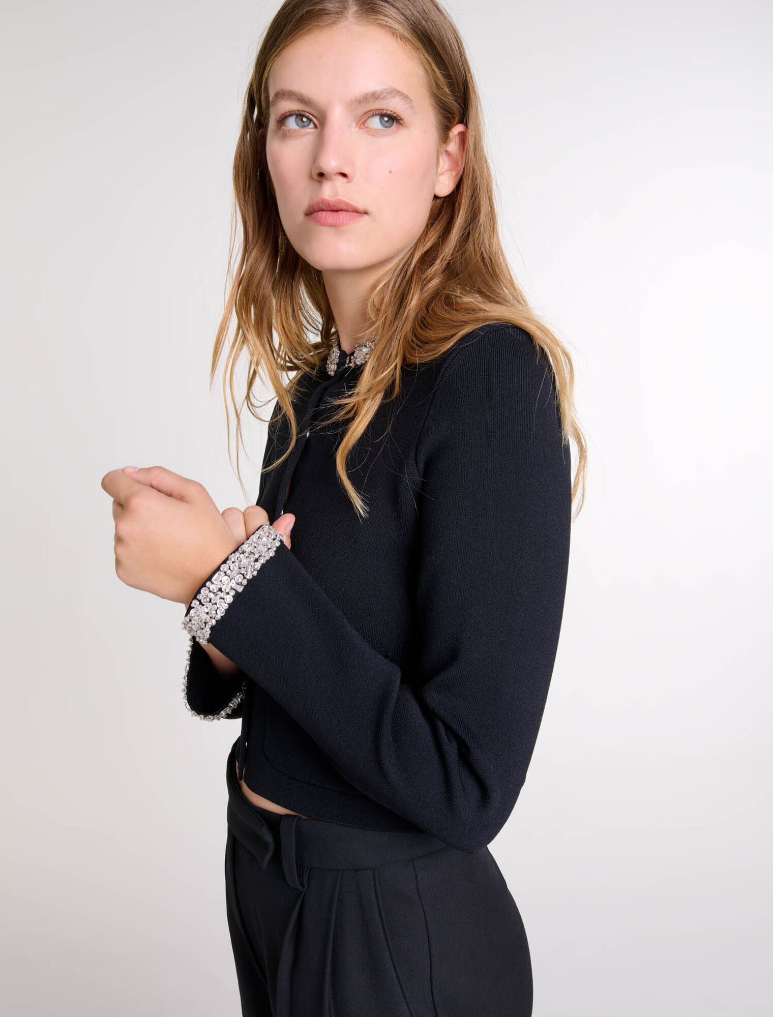 Cardigan con bordi glitterati