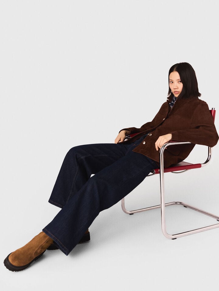 Jeans larghi con tasche applicate