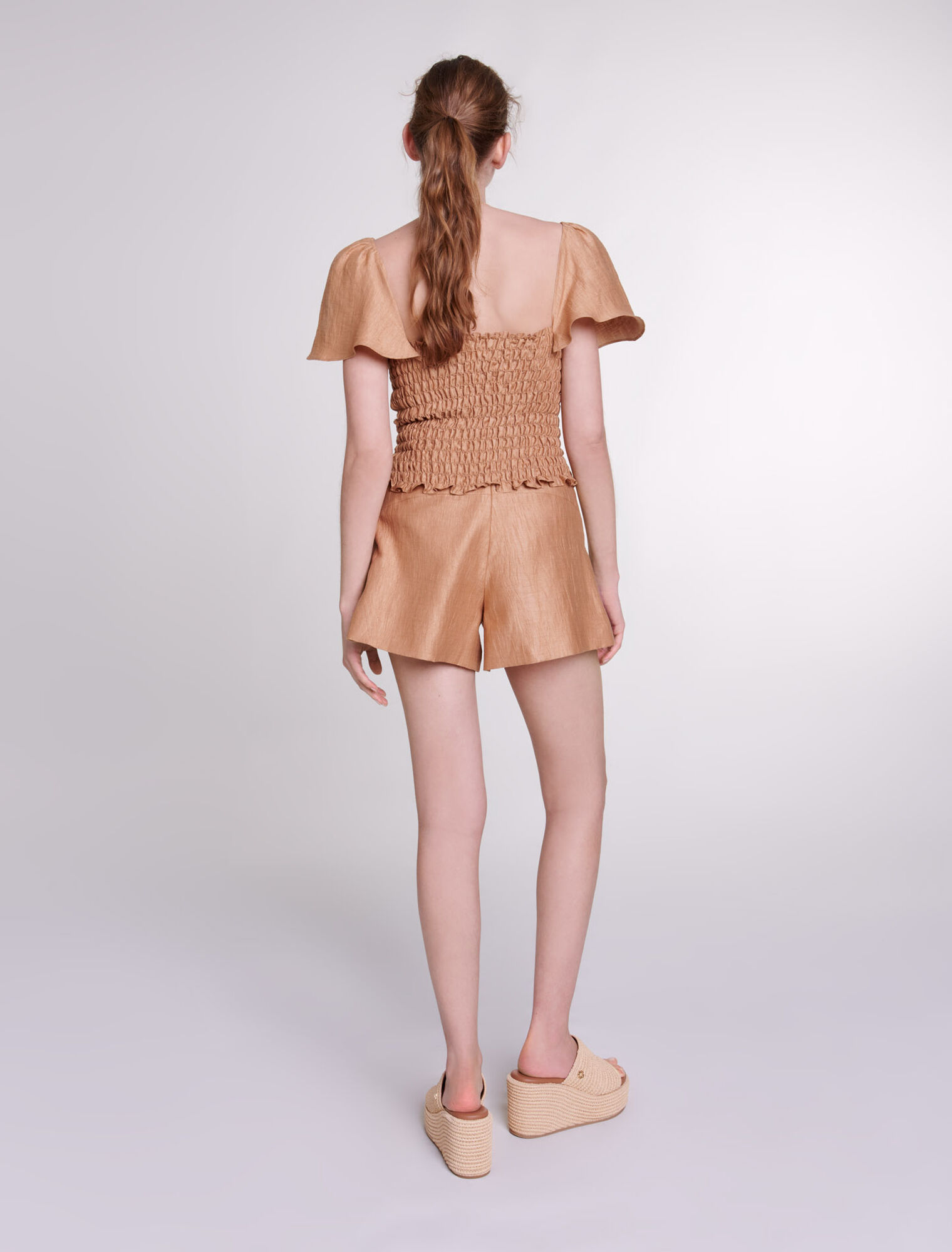 Top in lino con volant