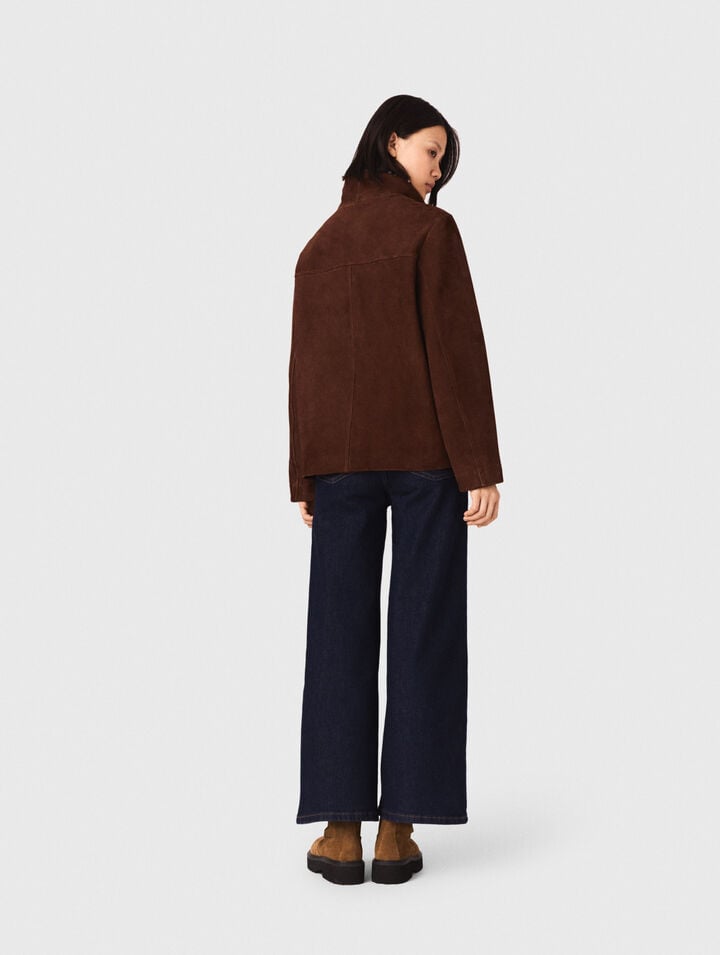 Jeans larghi con tasche applicate