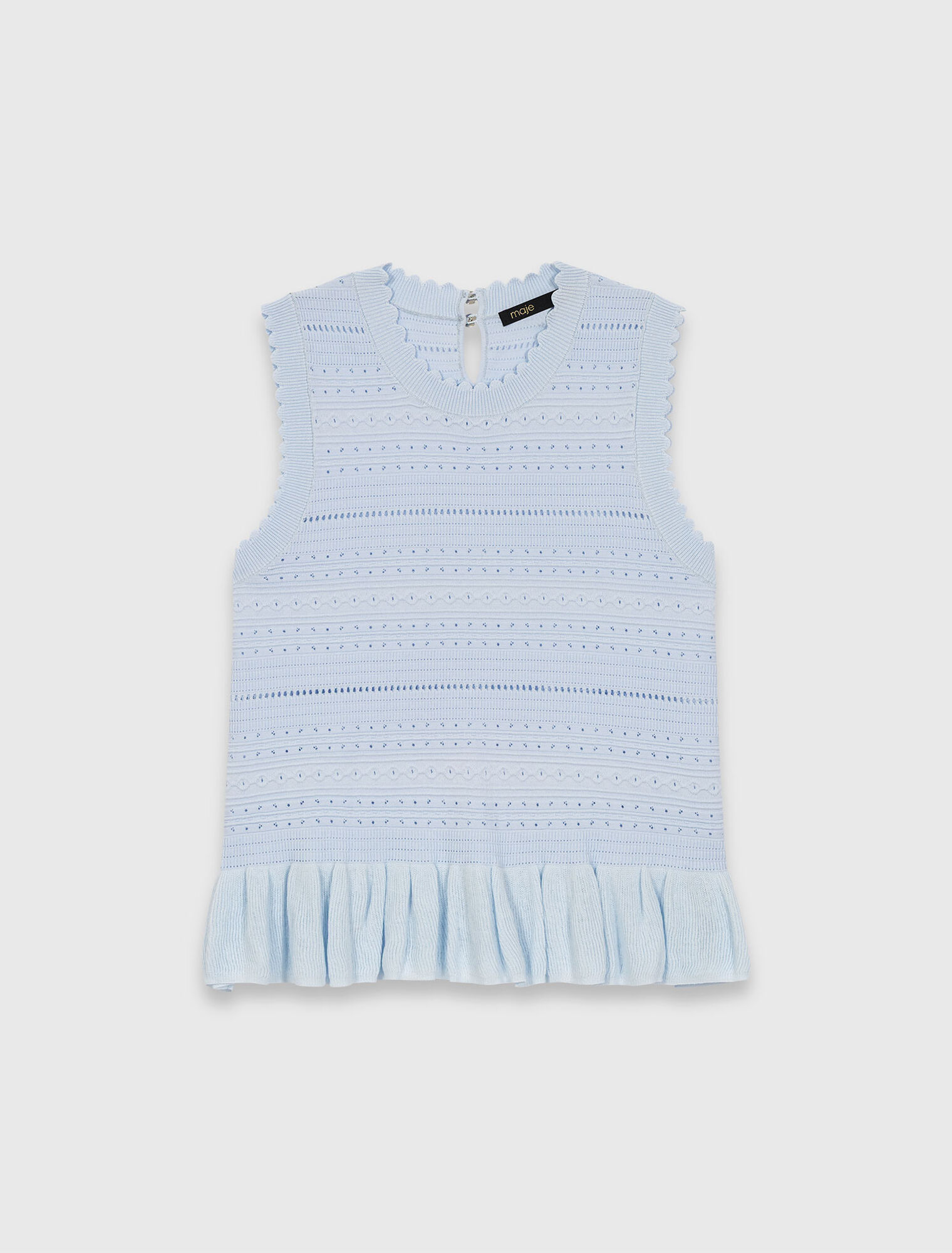 Top in maglia con volant