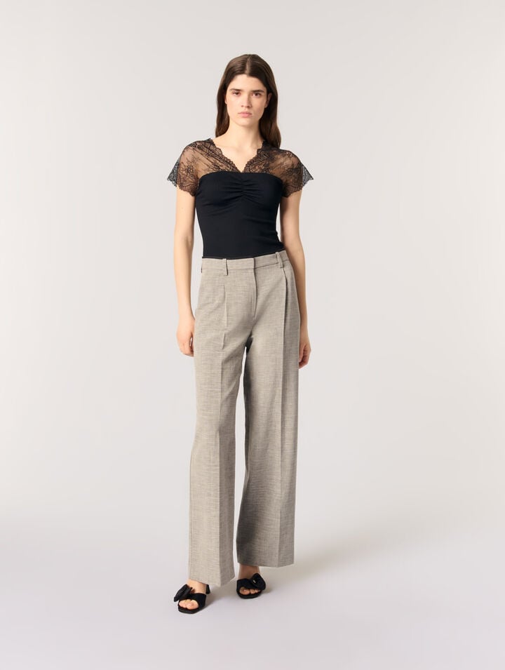 Top in jersey con applicazioni in pizzo