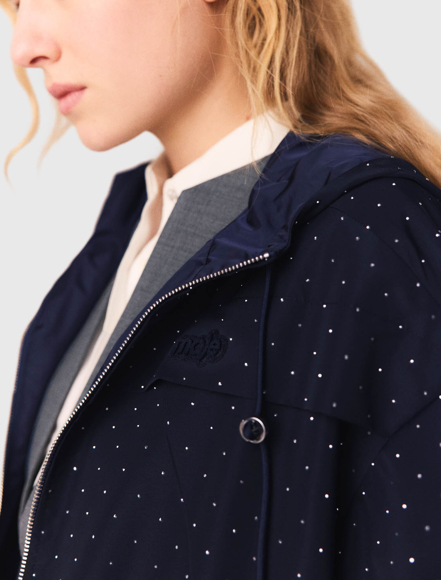 Antivento con glitter e cappuccio