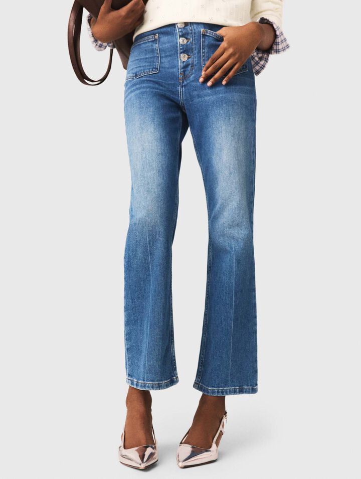 Jeans in denim con tasche