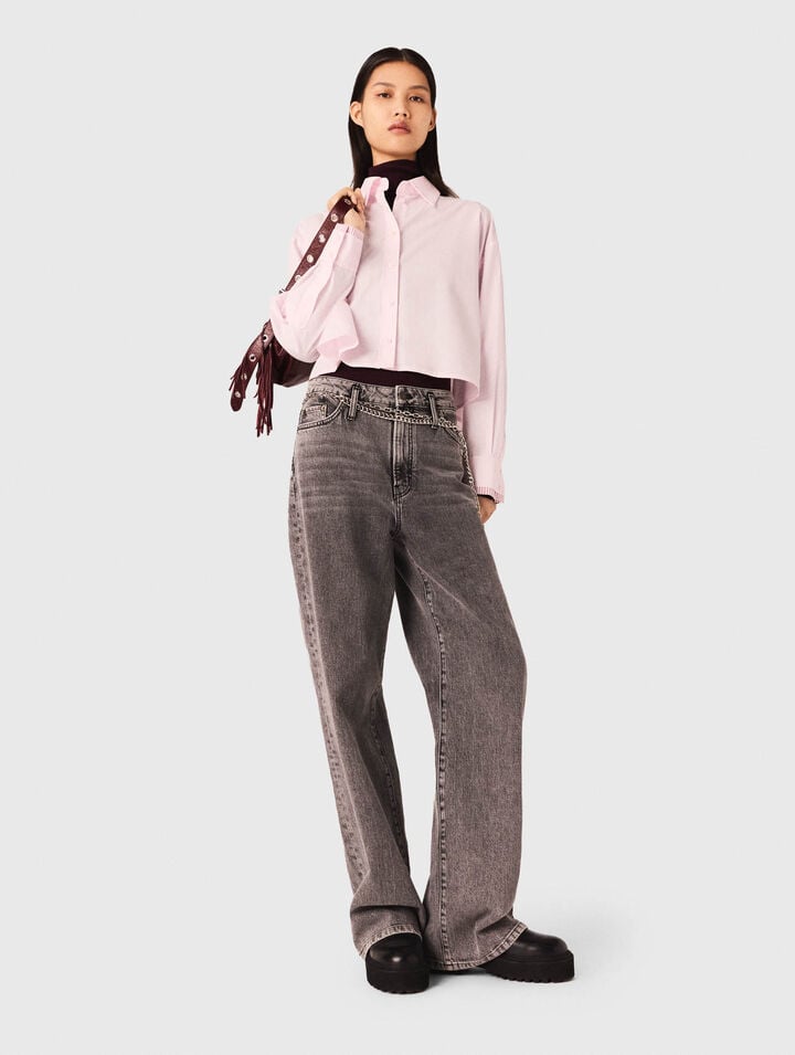 Jeans larghi e cintura a maglie