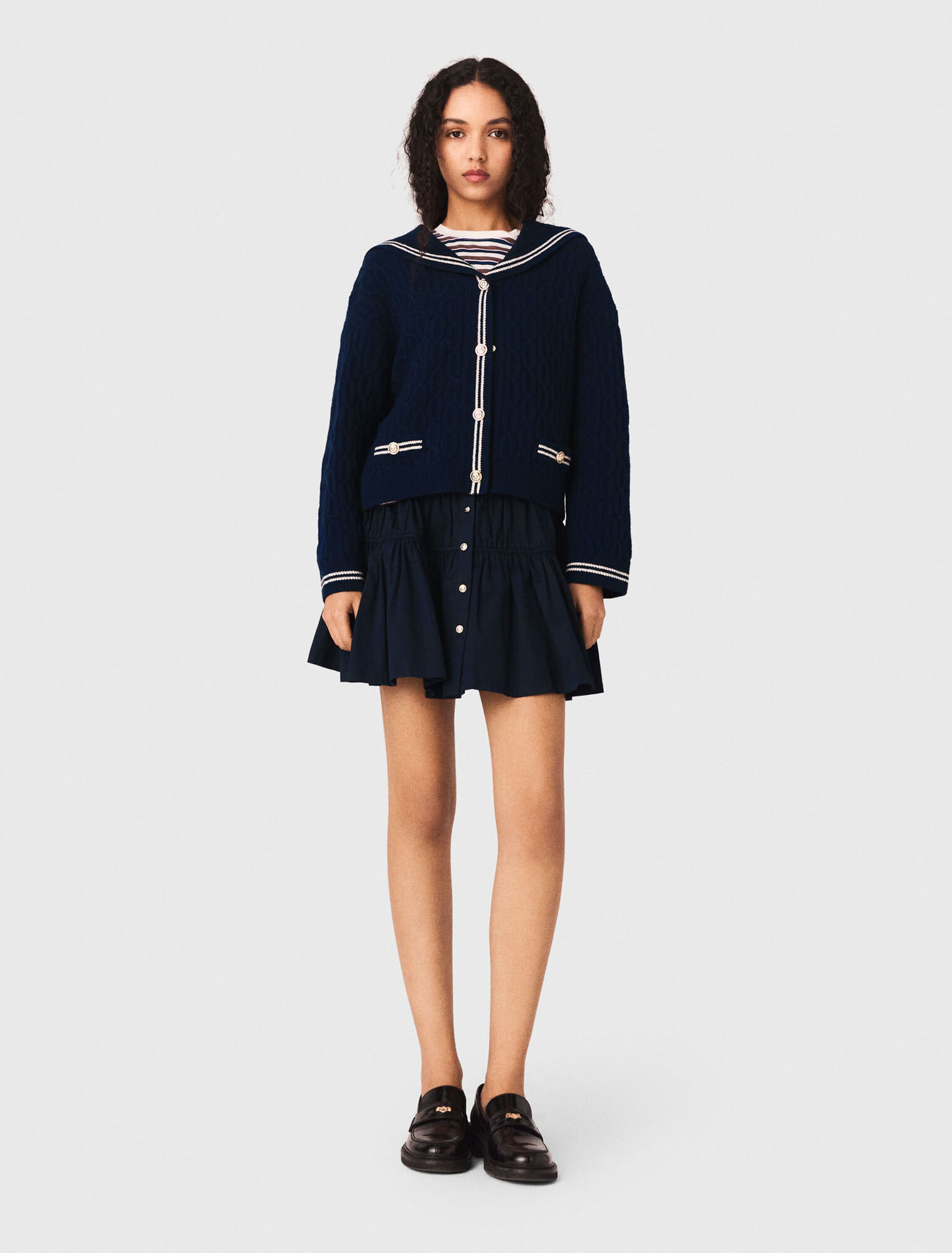 Cardigan a trecce con scollo barca