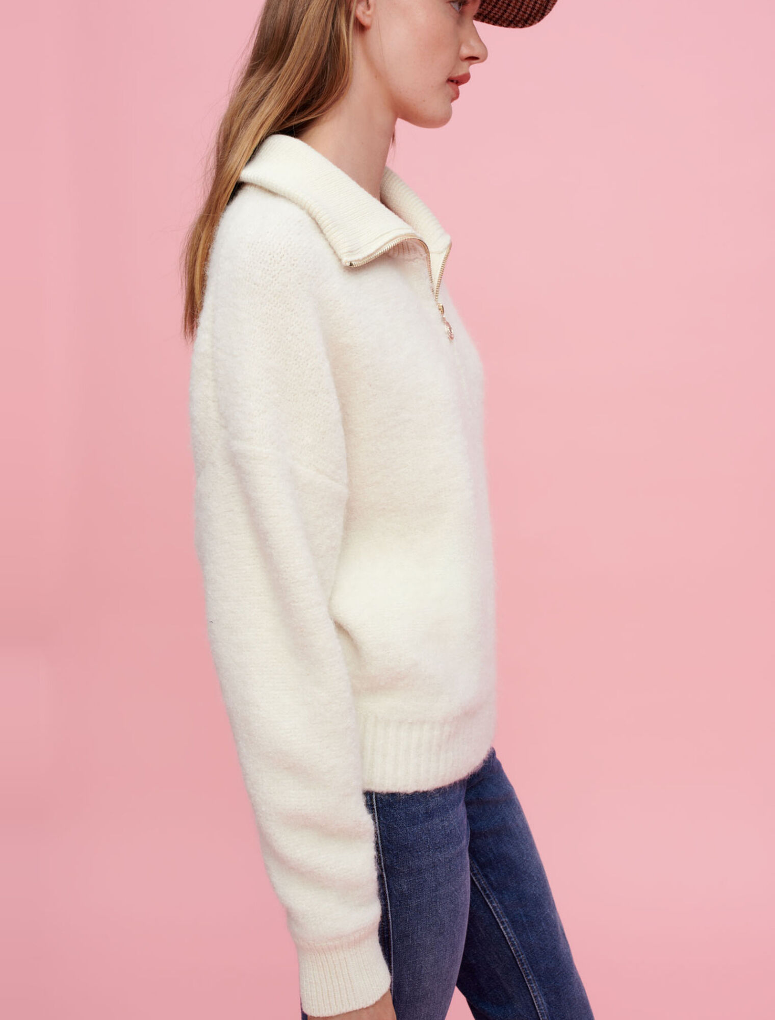 Pullover in bouclé écru a collo alto