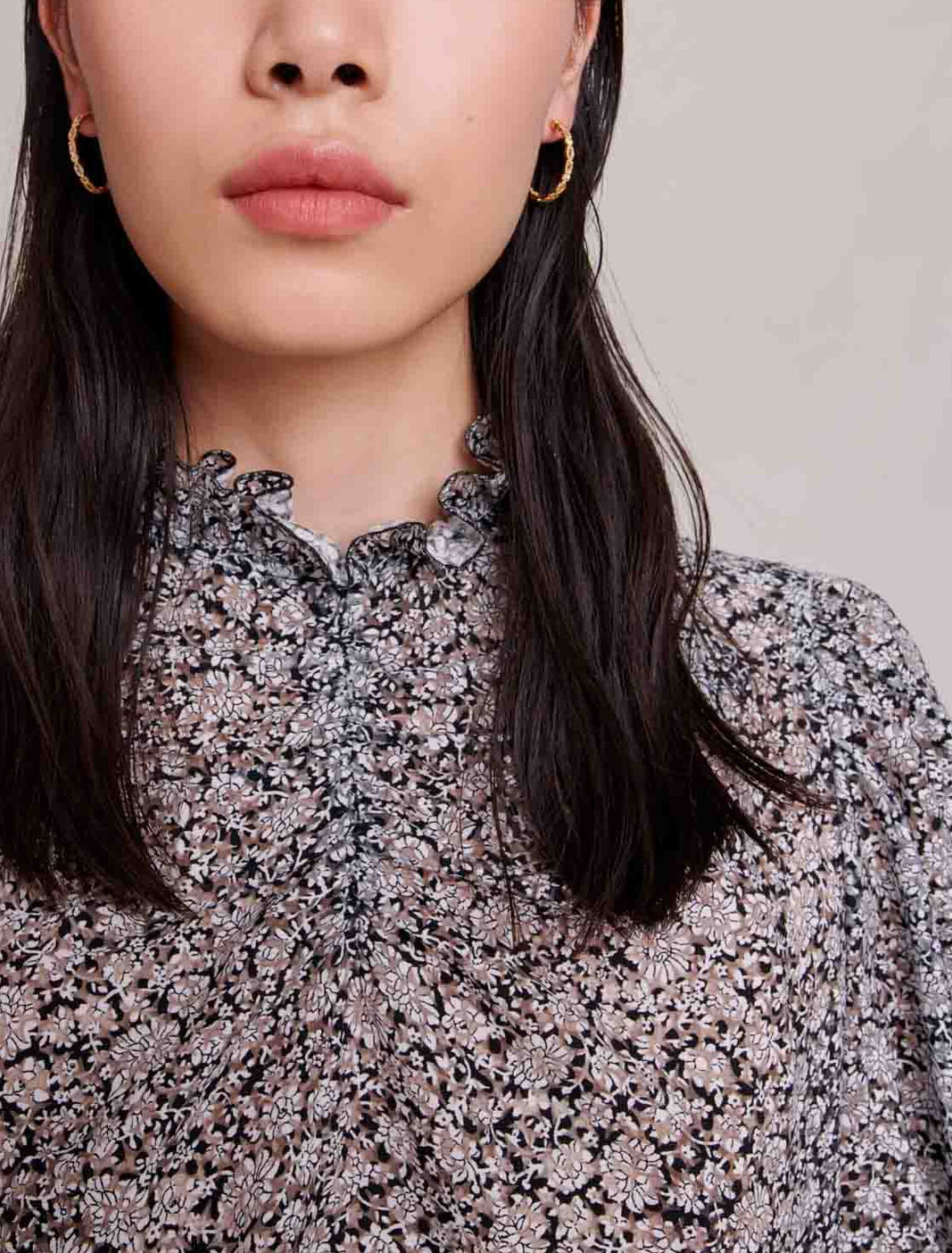 Blusa con stampa a fiori