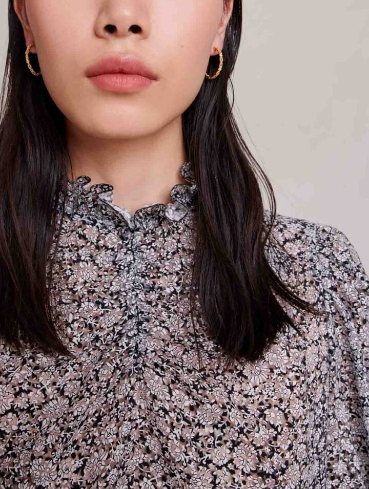 Blusa con stampa a fiori