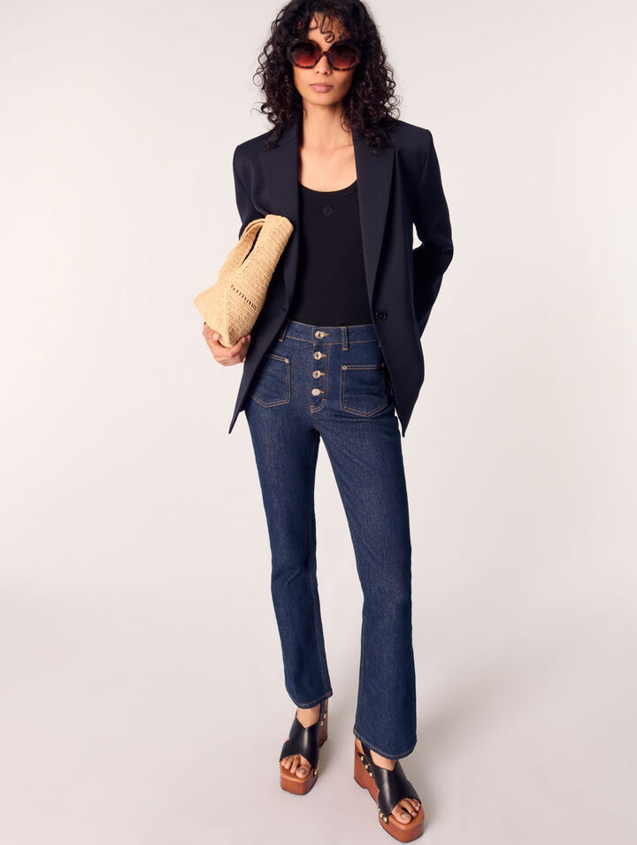 Jeans in denim con tasche