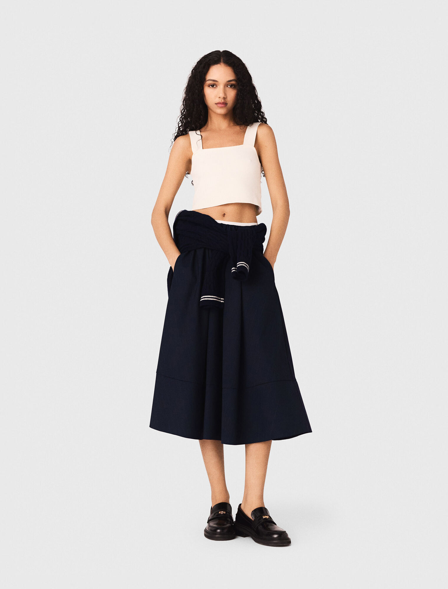 Top crop in maglia con spalline