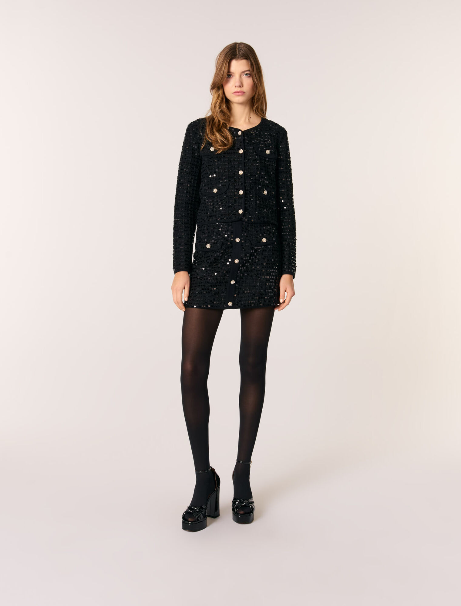 Cardigan corto con lustrini