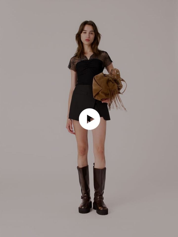 Top in jersey con applicazioni in pizzo