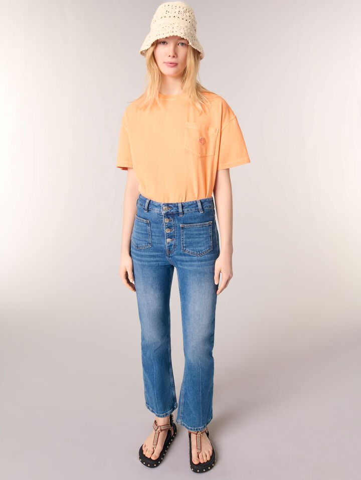 Jeans in denim con tasche