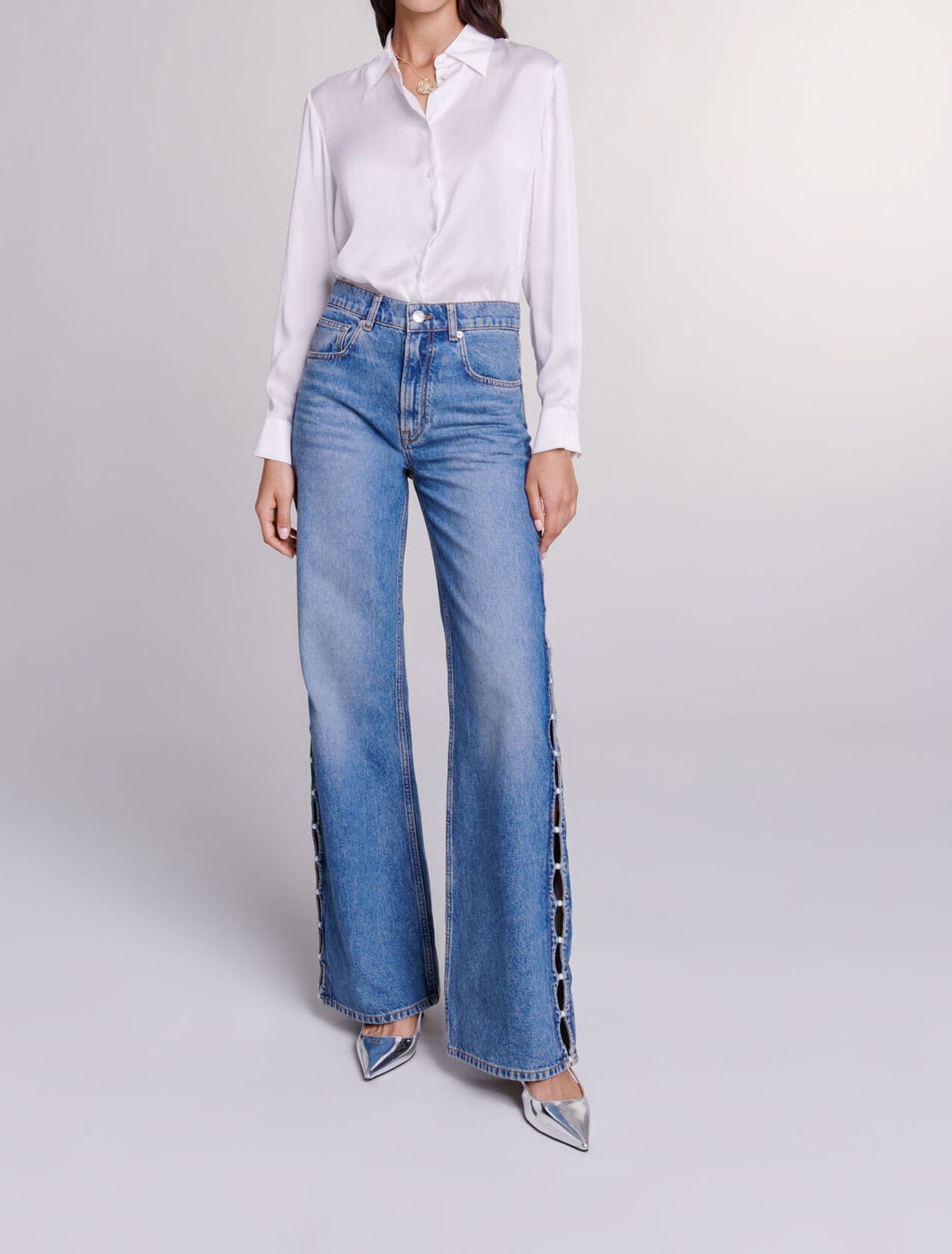 Jeans dritti traforati con perline