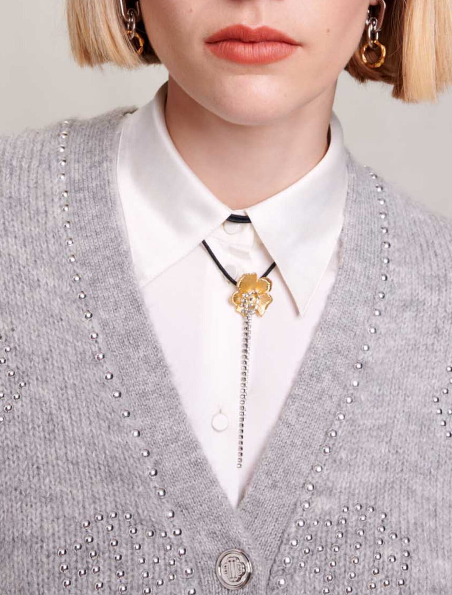 Cardigan con chiusura a trifoglio