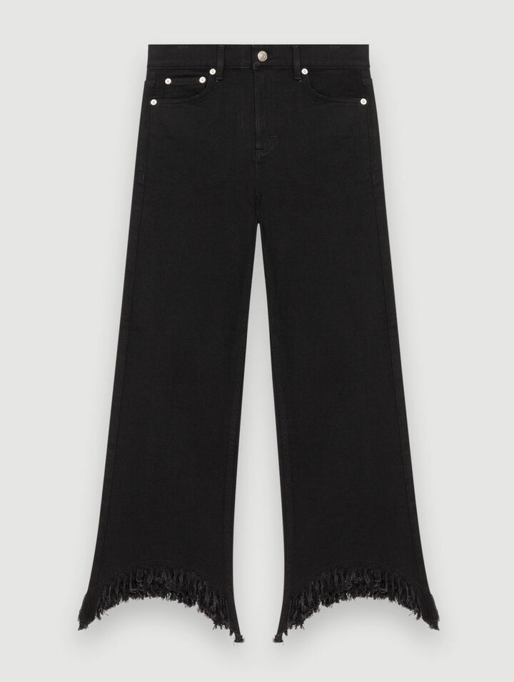 Jeans a vita alta con fondo strappato