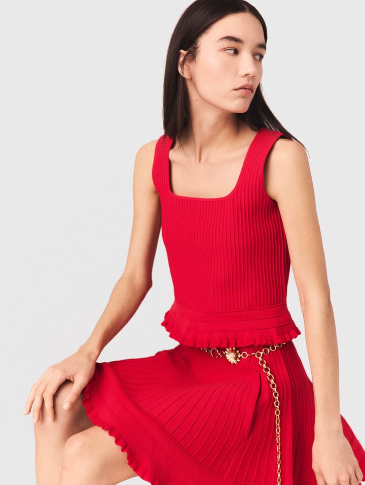 Top in maglia con volant