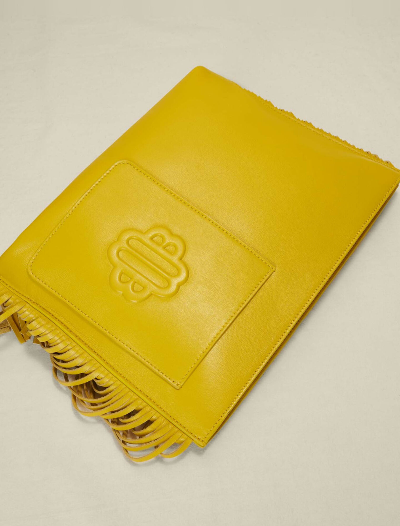 Pochette in pelle con frange