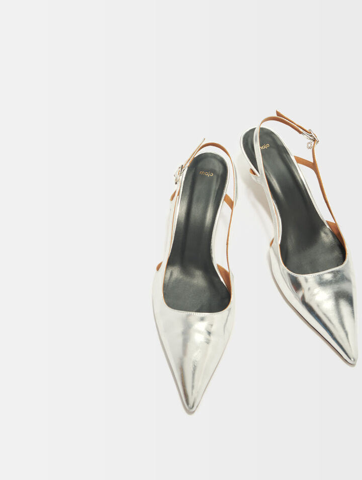 D&eacute;collet&eacute;, cinturino in pelle argentata