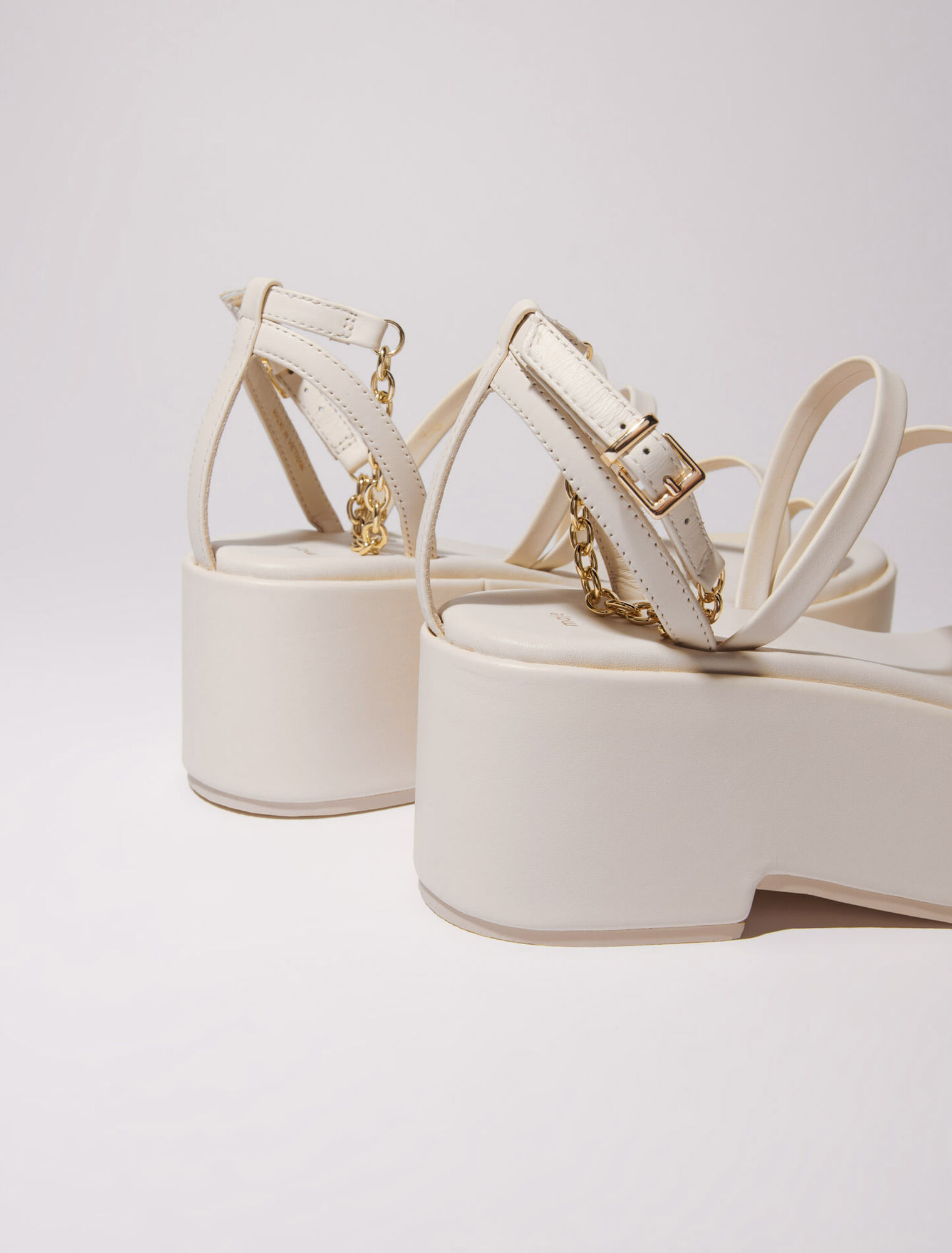 Sandali con zeppa in pelle