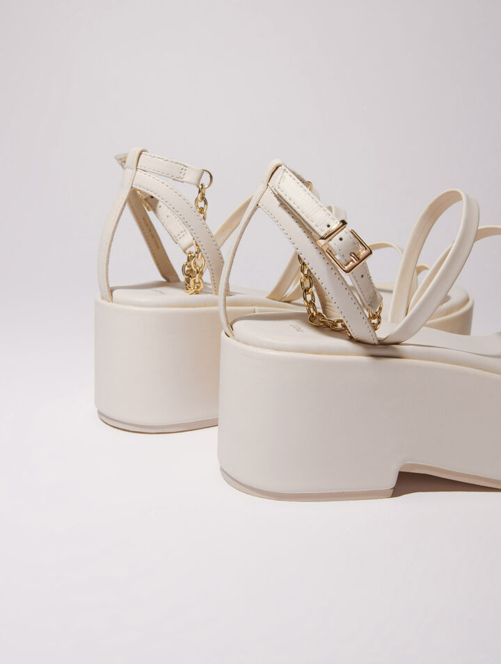 Sandali con zeppa in pelle