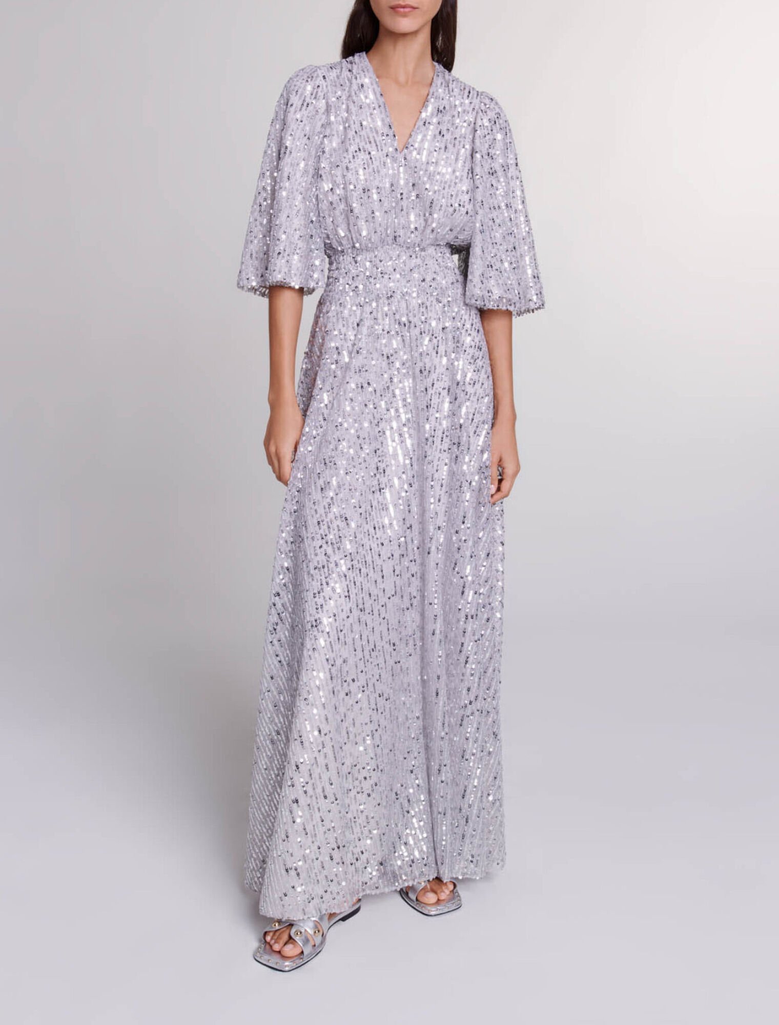 Abito lungo con lustrini