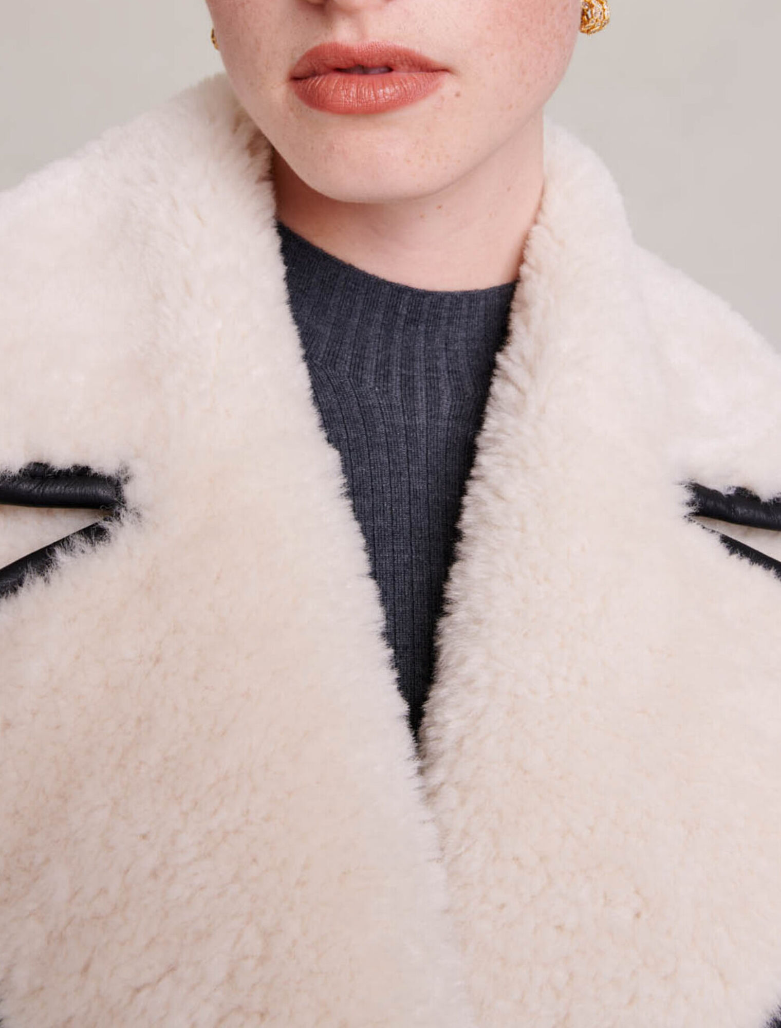 Cappotto corto in ecopelliccia