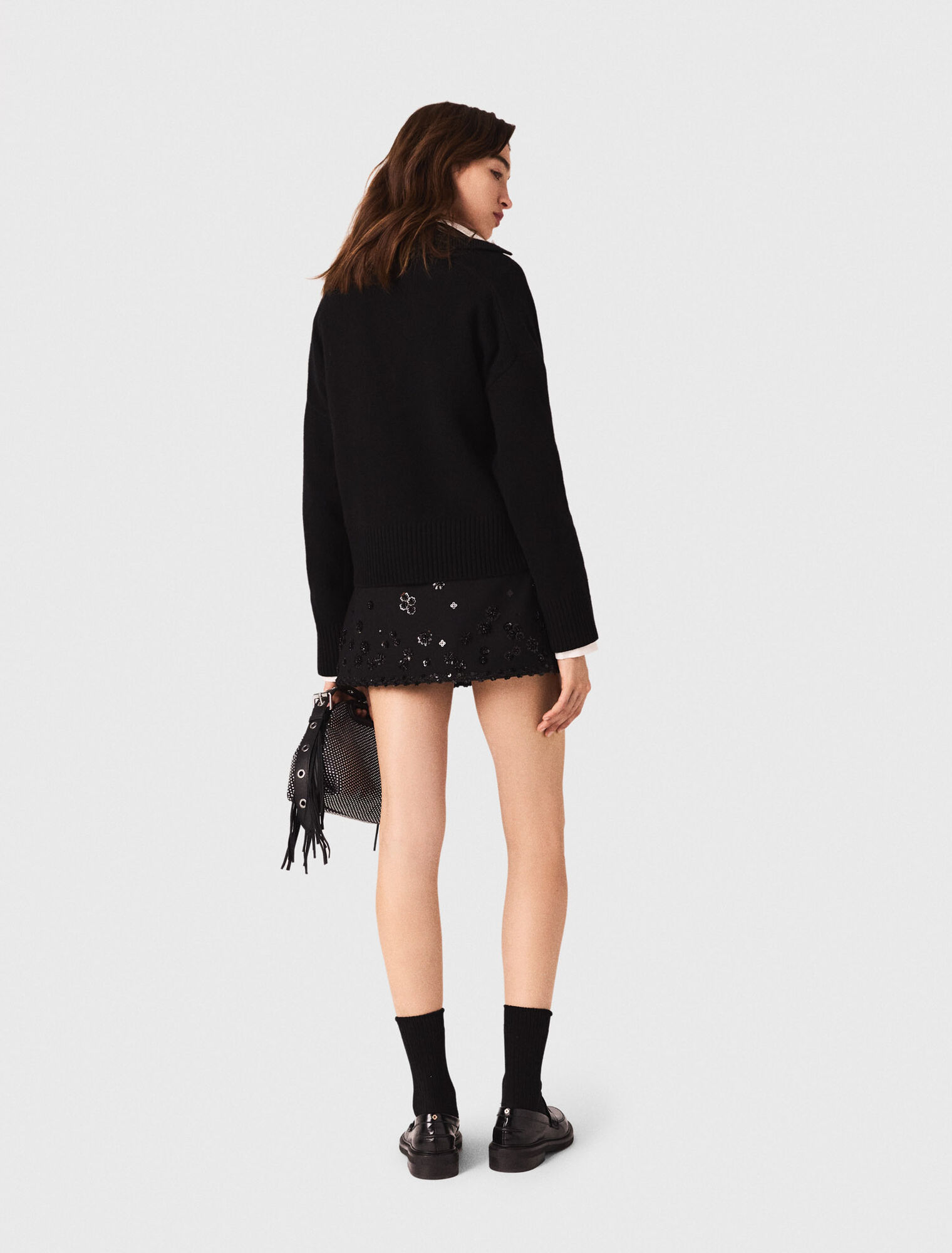 Maglione con collo polo aperto