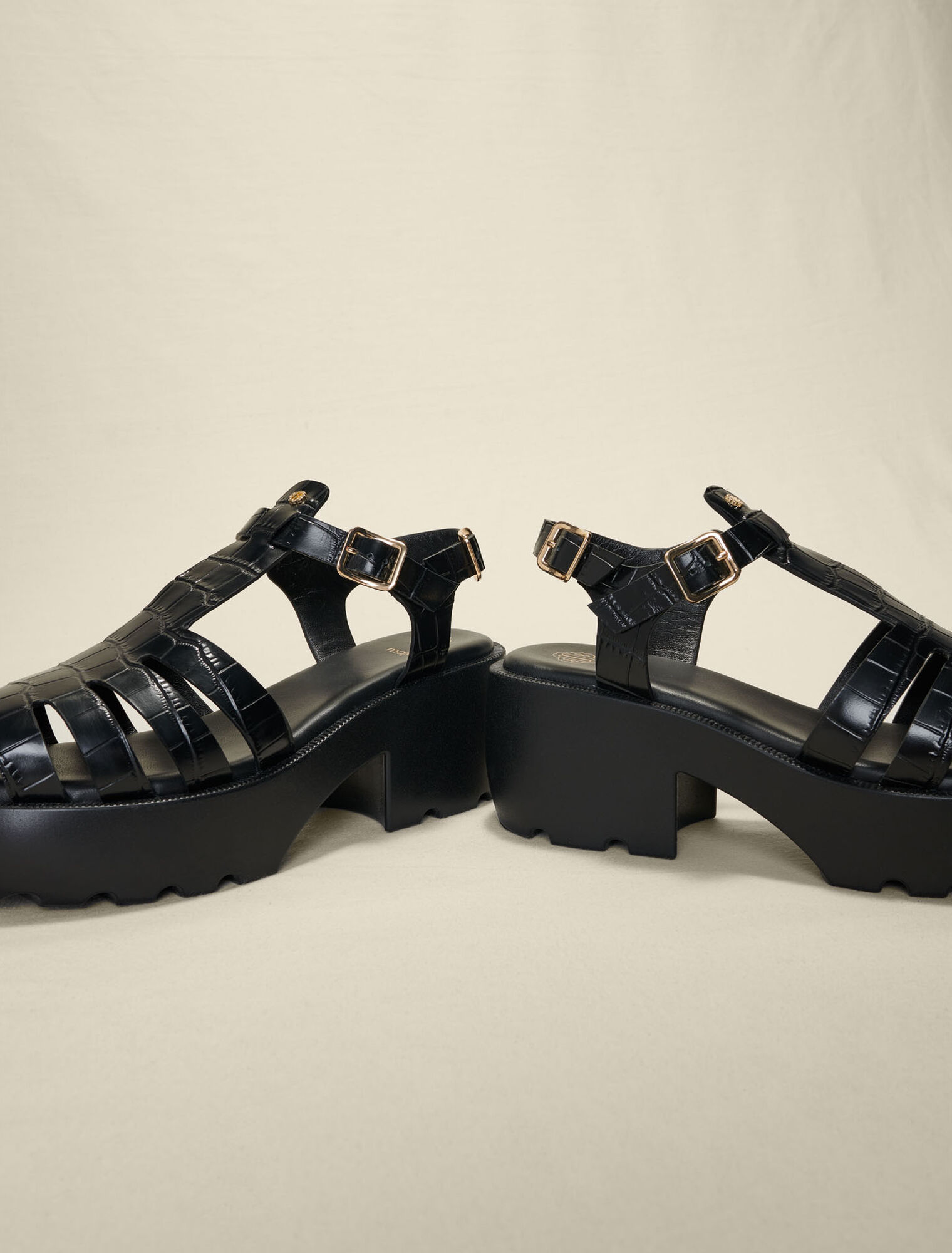 Sandali dentellati in pelle