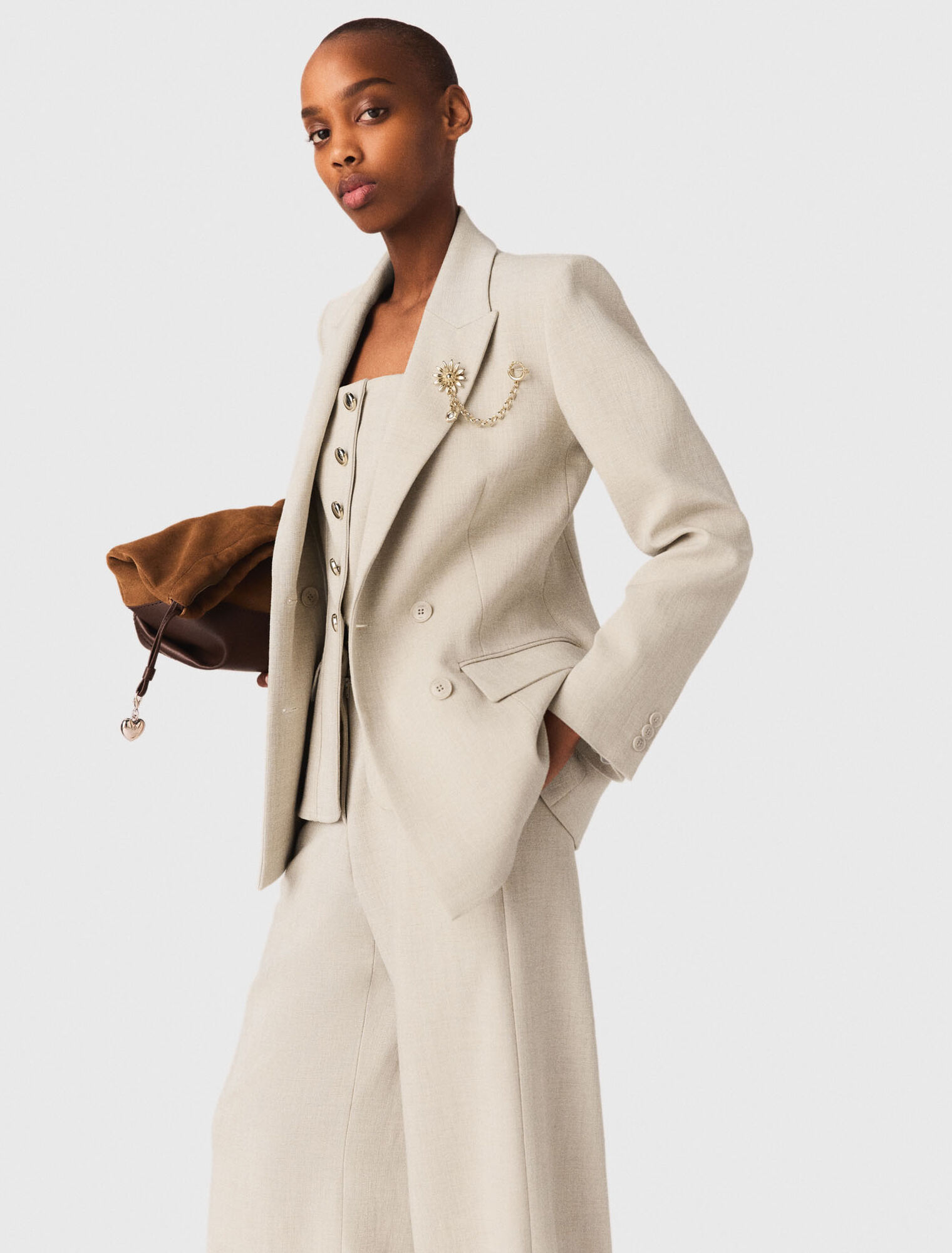 Giacca da tailleur con spilla