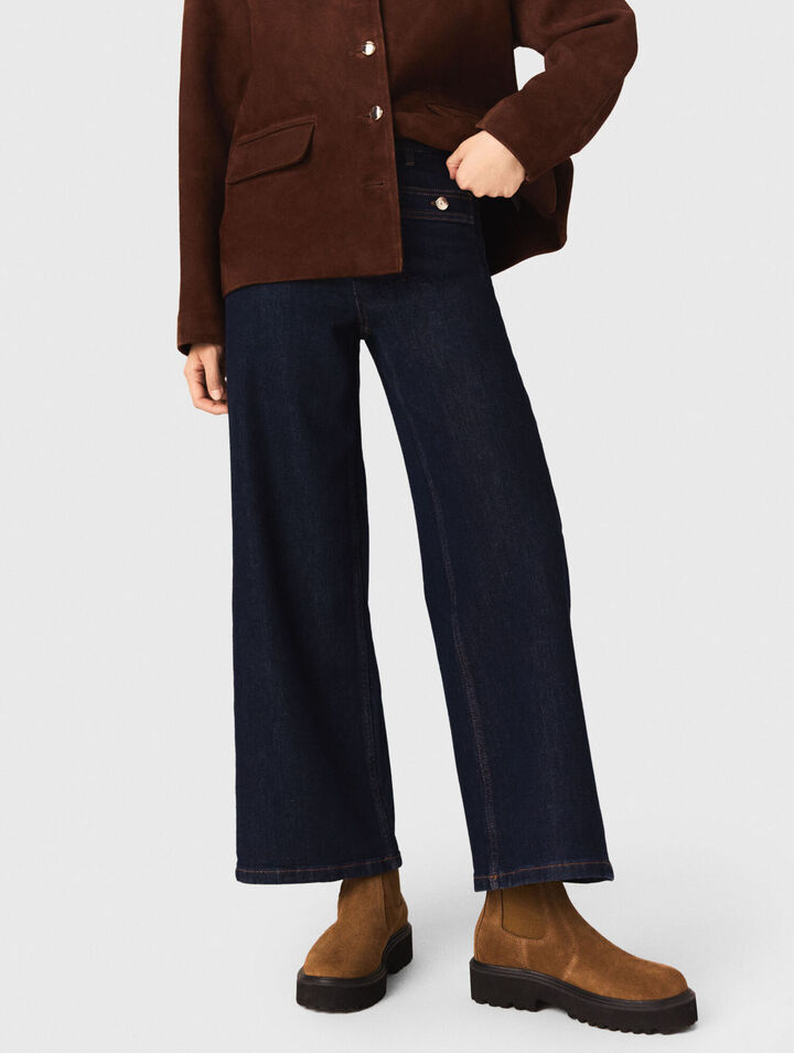 Jeans larghi con tasche applicate