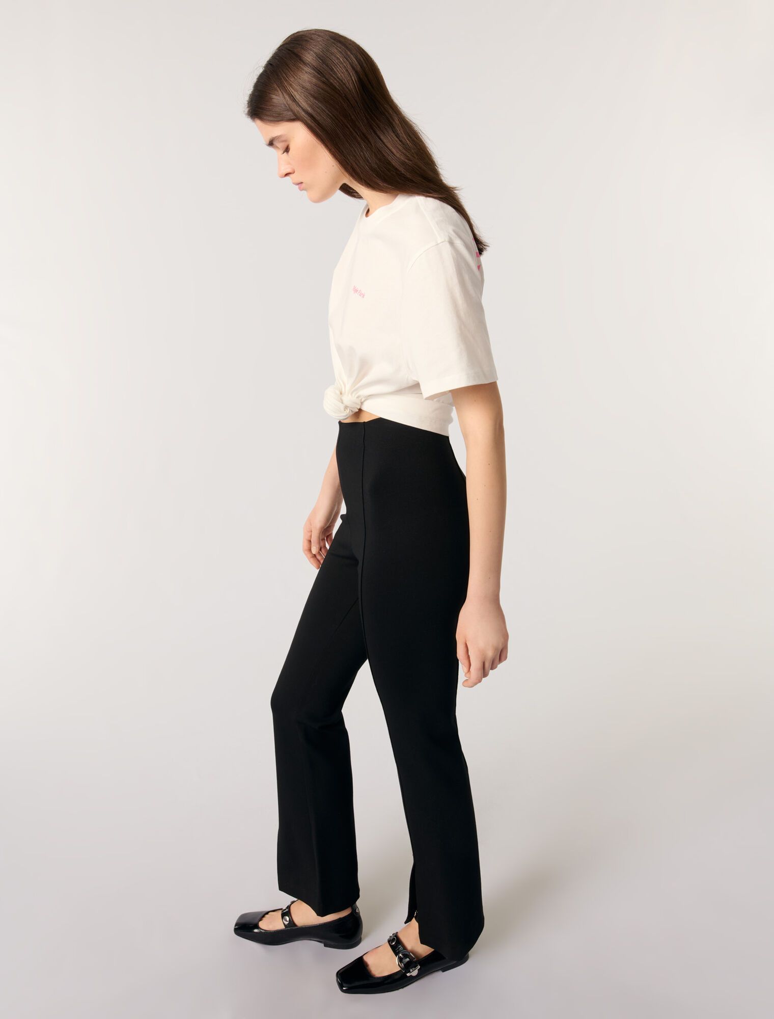 Pantaloni con spacco