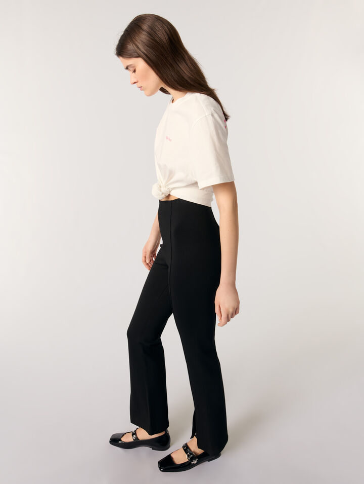 Pantaloni con spacco