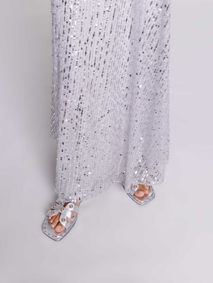 Mules in pelle borchiate